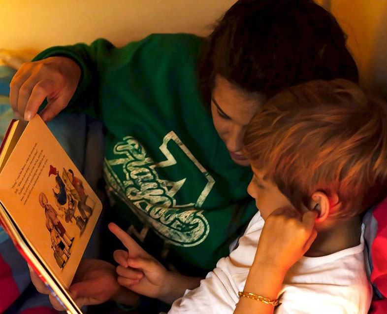 Mother and son looking at a picture book