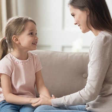 Mom talking to her daughter